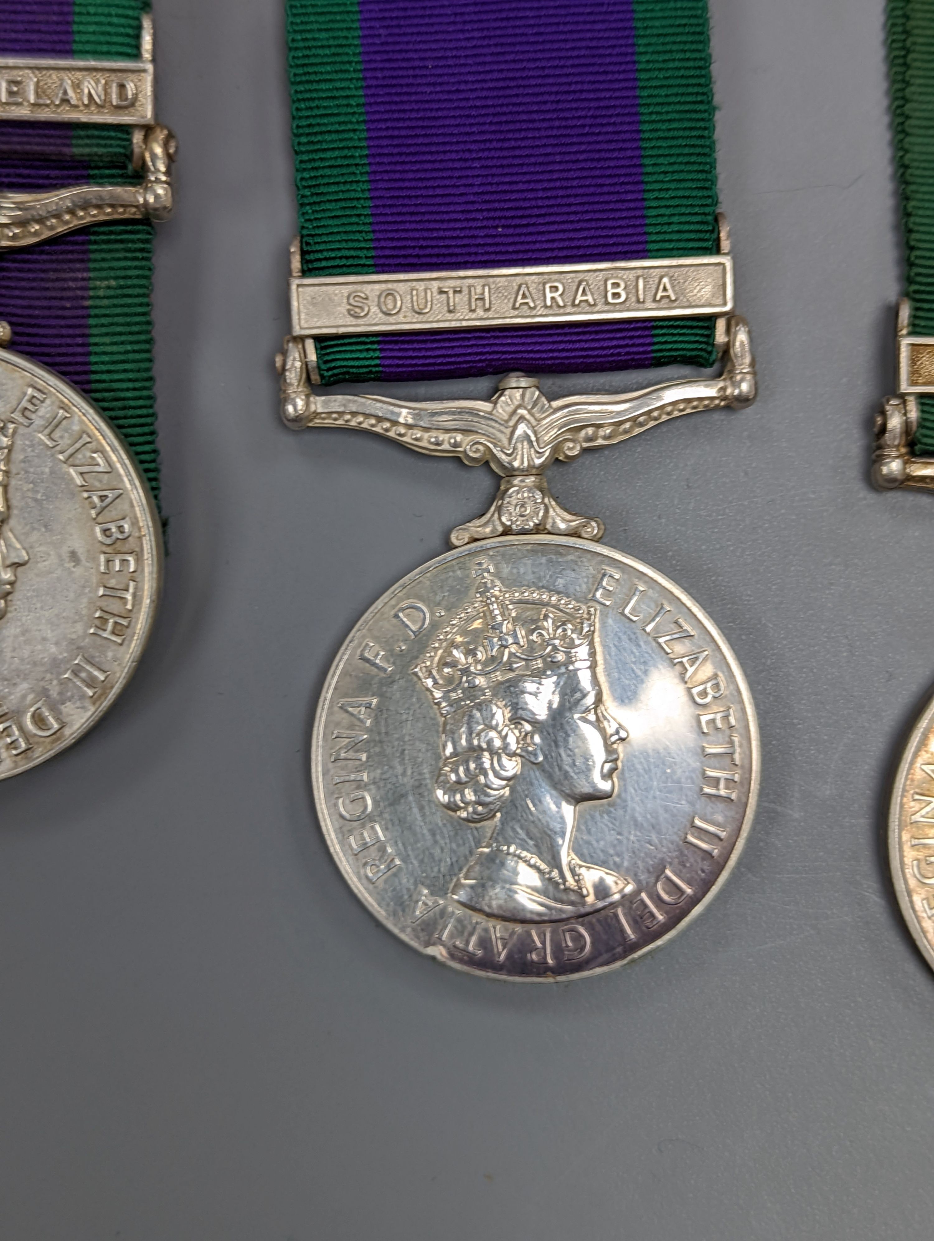 Five QEII GSM, three with a Northern Island clasp (one with UN medal), and two with South Arabia clasps